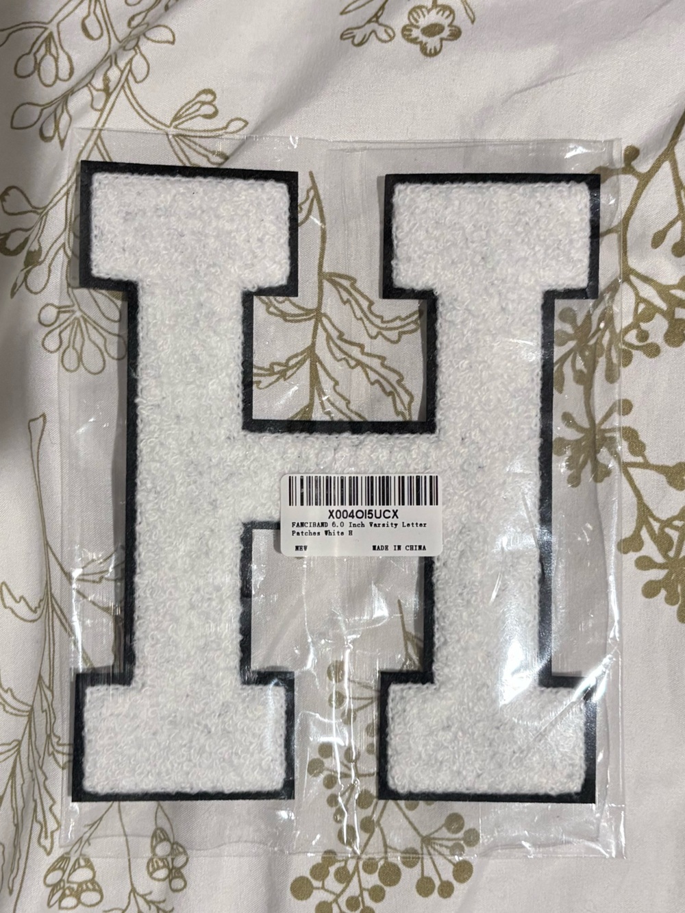 Variant letter patch | 'H' Iron-On Patch with Black Trim